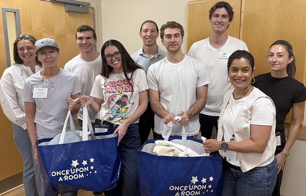 JLL volunteers working with Once Upon a Room makeover kids hospital rooms